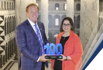 Jim Garrettson Delivers 2023 Wash100 Award to CGI Federal President Stephanie Mango